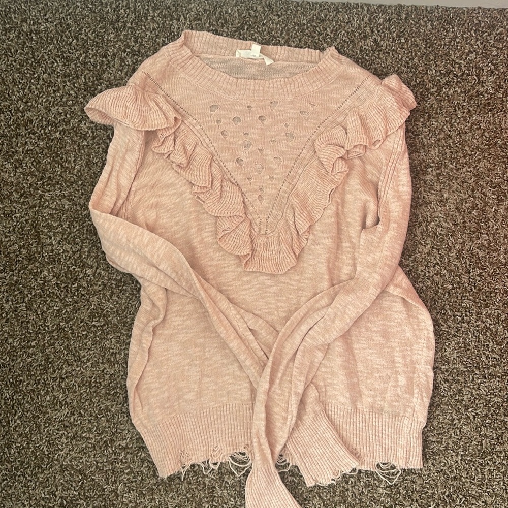 Distressed ruffle top